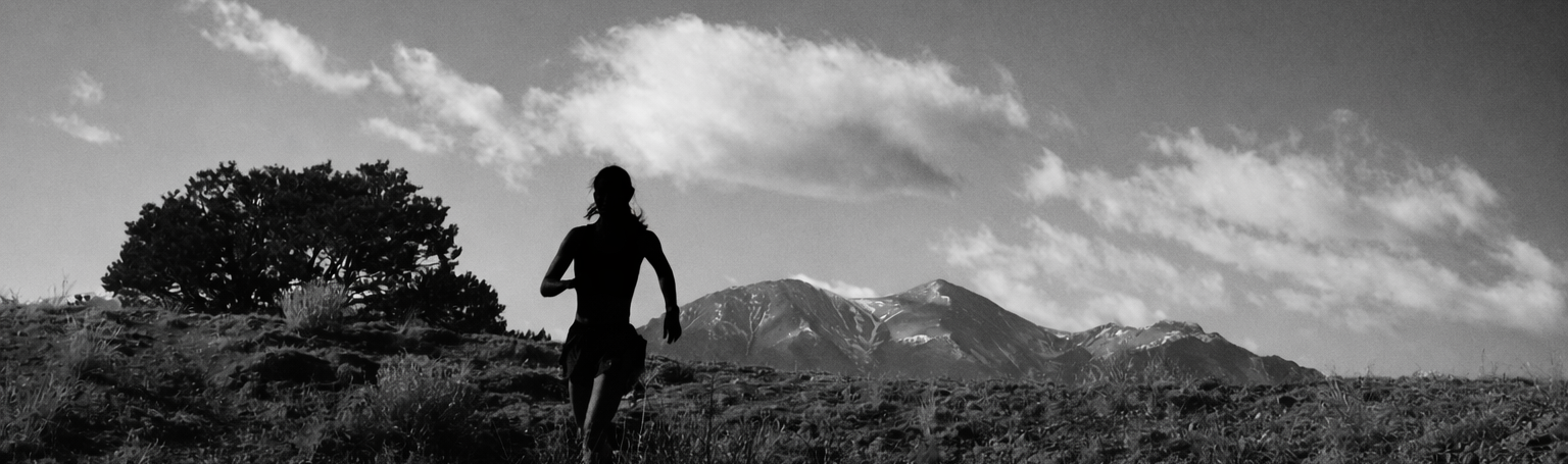 Runner against mountain landscape